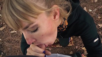 A Stalker’s Secret Thrill: Karina Drops To Her Knees And Services A Guard’s Cock At A Deserted Camp
