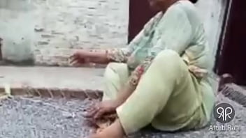 Sultry Desi Aunty Puffs On A Cigarette With Seductive Allure